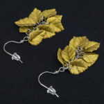 Серьги листики античное золото грозди металлик (Бижутерия)